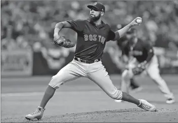  ?? CHRIS O’MEARA/AP PHOTO ?? David Price pitched seven scoreless innings to lead the Red Sox over Tampa Bay 1-0 on Friday night.