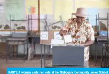  ??  ?? KANYE: A woman casts her vote at the Ntebogang Community Junior School polling station. —AFP