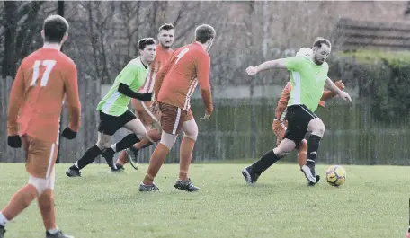  ??  ?? Carpets Centre Elite (red/white) take on Ashbrooke Rosedene at Southwick.