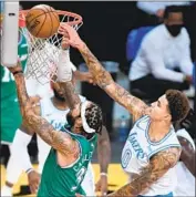  ?? Wally Skalij Los Angeles Times ?? KYLE KUZMA blocks a shot by Dallas’ Willie Cauley- Stein to go along with his 13 points.