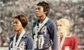  ?? Tokyo Games. Photograph: Bettmann/Bettmann Archive ?? Wyomia Tyus of the US, center, won the first of two Olympic golds in the 100m at the 1964