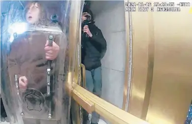  ?? U.S. DEPARTMENT­OFJUSTICE ?? Patrick Edward McCaughey, 23, from Ridgefield is being charged in connection with the riot on Jan. 6 at the U.S. Capitol in Washington, federal officials said. This photo is a bodycam video screenshot of McCaughey from Jan. 6.