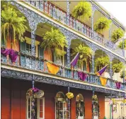  ?? GETTY IMAGES ?? New Orleans’ French Quarter is filled with historic buildings, jazz clubs and unforgetta­ble ambience.