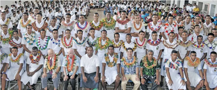  ?? Photo: Ronald Kumar ?? Marist Brothers High School 2018 school prefects with Fiji Airways Fijian 7s coach Gareth Barber and teachers following their prefect induction on February 9, 2018.