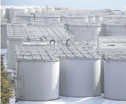  ?? —AFP ?? OUT OF SPACE Storage tanks holding 1.3 million cubic liters of filtered water from the crippled Fukushima Dai-ichi nuclear power plant are nearly full, officials say.