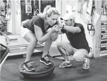  ?? PAT GRAHAM, AP ?? Skier Lindsey Vonn, working with trainer Martin Hager, says, “I’m just looking forward to going fast.”