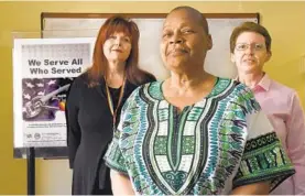  ?? AMY DAVIS/BALTIMORE SUN ?? Jillian Silveira, left, LGBT veteran care coordinato­r, with VA patients Shirley Maniece and Tracy Robertson. Maniece and Robertson had to hide their sexuality in the Air Force.