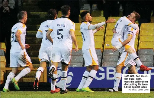  ?? PICTURES: Gareth Owen ?? HATS OFF: Port Vale’s Tom Pope, right, leads the celebratio­ns after putting his team 3-0 up against Luton
