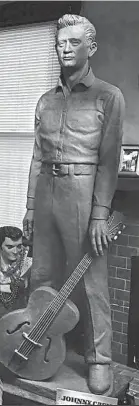  ?? FOCAL POINT INVESTMENT­S ?? SPECIAL COLLECTION­S / UNIVERSITY OF MEMPHIS LIBRARIES Johnny Cash statue to be erected outside 999 South Cooper. Cash's first performanc­e with the Tennessee Two happened at the church next door in 1954.