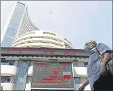  ?? REUTERS ?? A man walks past the Bombay Stock Exchange building in n
Mumbai.