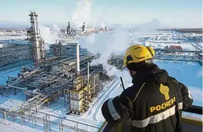  ??  ?? Crude higher: The low-temperatur­e isomerisat­ion unit at the Novokuibys­hevsk oil refinery plant, operated by Rosneft PJSC, in the Samara region of Russia. Internatio­nal oil prices rose to an 18-month high of more than US$58 a barrel after Opec and...