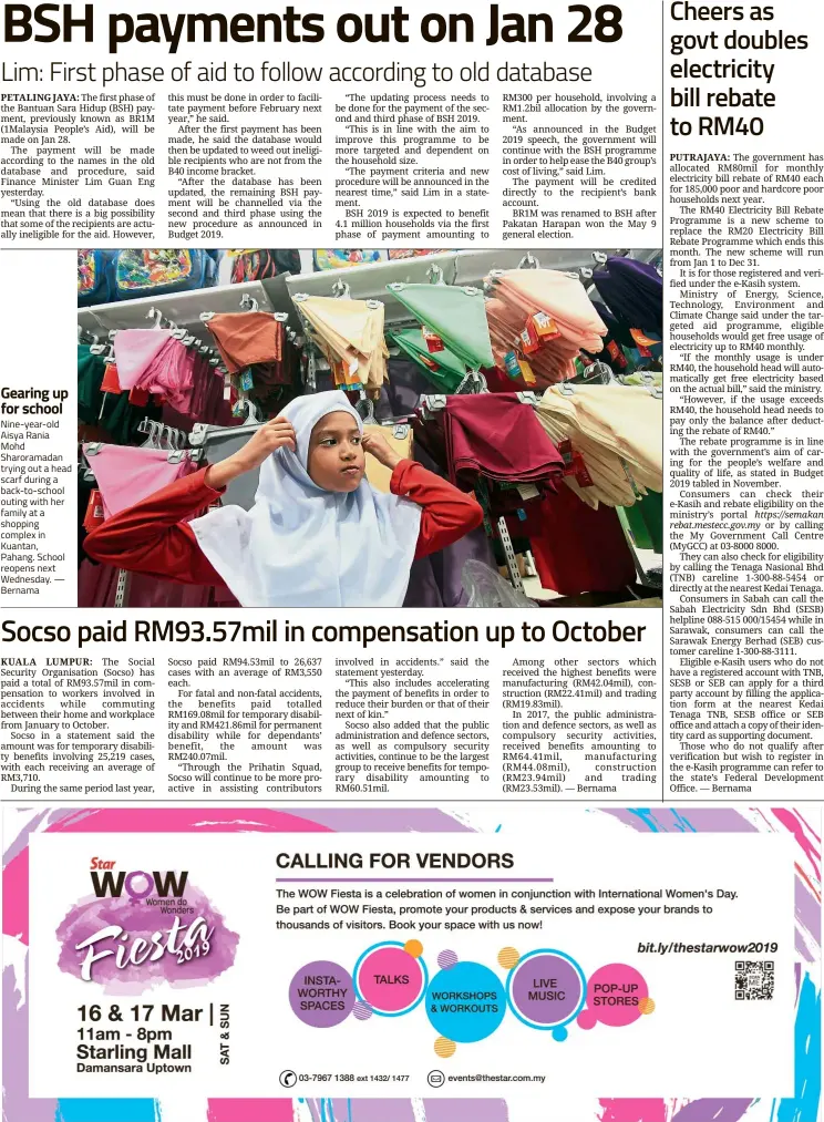  ??  ?? Nine-year-old Aisya Rania Mohd Sharoramad­an trying out a head scarf during a back-to-school outing with her family at a shopping complex in Kuantan, Pahang. School reopens next Wednesday. — Bernama