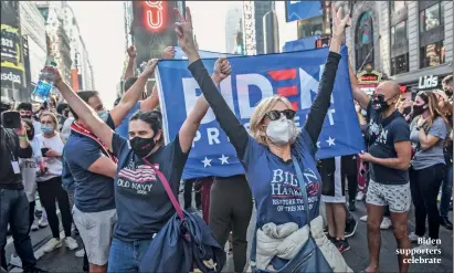  ?? PHOTO: GETTY IMAGES ?? Biden supporters celebrate