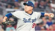  ?? LOGAN RIELY GETTY IMAGES ?? Hyun-Jin Ryu moves in as the ace of the Blue Jays staff after recording a sub-3.00 ERA over six seasons with the Dodgers.