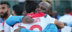  ?? | BackpagePi­x ?? AYMAN El Hassouni of Wydad embraces Pitso Mosimane.