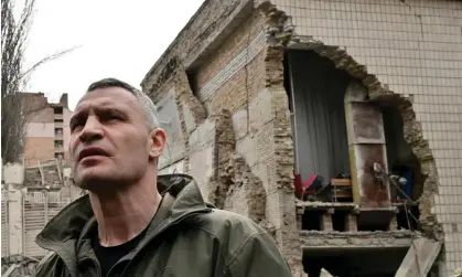  ?? Sergei Supinsky/AFP/Getty Images ?? Kyiv's mayor, Vitali Klitschko, outside a building badly damaged by Russian missile strikes on the Ukrainian capital on Monday. Photograph: