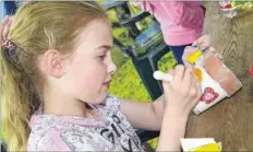  ?? FM4737436 FM4737432/FM4737433 ?? Left, Mia Noakes, 10, decorates her cress pot at Godinton House Right, Ellie Shevlin, five Below, left, Sara Miles with Jack Keys, nine, Will Keys, six, Harry Keys, 11, and Max Keys, eight. Right, Lillian Strickland, 10, William Humphrey, five, and,...