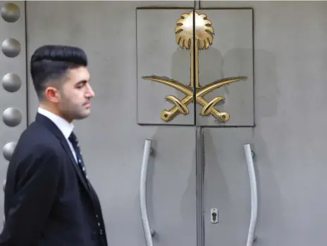  ?? (Reuters) ?? A SECURITY staff member stands at the entrance of Saudi Arabia’s consulate in Istanbul on October 31.