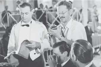  ??  ?? Tabernero con Luis Sandrini. En el rodaje de “El seductor” (1950), un film de Luis Bayón Herrera.