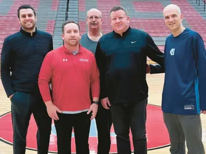  ?? THE MORNING CALL ?? Parkland boys basketball coaches from the 2022-23 staff, which includes many on this year’s staff in Eddie Ohlson’s first year as head coach. From left, Austin Beidelman, Ohlson, Paul Stewart, former head coach Andy Stephens, and B.J. Dugan.