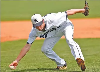  ?? STAFF FILE PHOTO BY ROBIN RUDD ?? Gordon Lee third baseman Ethan Clark fields a bunt against Charlton County on Wednesday. The teams split a doublehead­er that day, and Clark was the winning pitcher Thursday in the best-of-three series.