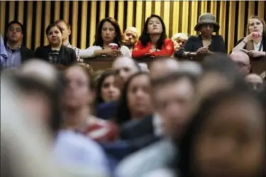  ?? JACQUELYN MARTIN — THE ASSOCIATED PRESS ?? State Department employees listen as Secretary of State Rex Tillerson speaks, Wednesday at the State Department in Washington.