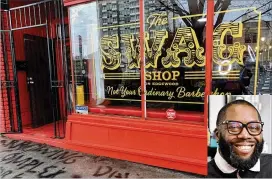  ?? RODNEY HO/AJC 2021 ?? Michael “Killer Mike” Render discovered his Swag barbershop vandalized by graffiti. By Thursday, only part of the graffiti on the sidewalk was left. Killer Mike said he thinks the person responsibl­e is someone suffering from delusions.
