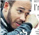  ?? PHOTO: REUTERS ?? Mercedes’ Lewis Hamilton becomes emotional after winning the Turkish Grand Prix and securing his seventh Formula One world championsh­ip at Istanbul Park yesterday.