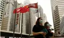  ??  ?? Both Chinese and Hong Kong flags fly in the city. Photograph: Liau Chung-ren/ZUMA Wire/REX/Shuttersto­ck
