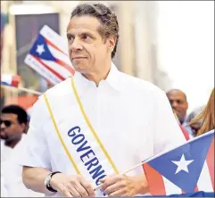  ??  ?? This time is different: Cuomo at the 2014 Puerto Rican Day Parade.