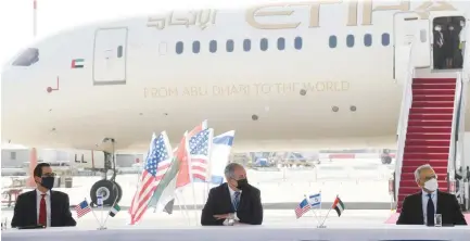  ?? ( Amos Ben Gershom/ GPO) ?? US SECRETARY of the Treasury Steven Mnuchin, Prime Minister Benjamin Netanyahu and United Arab Emirates Financial Affairs Minister Obaid Humaid Al Tayer at Ben- Gurion Airport yesterday.