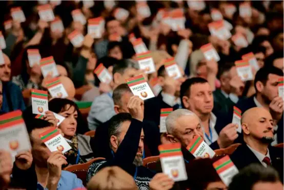  ?? STRINGER/AFP VIA GETTY IMAGES ?? Lawmakers took part in a congress of deputies of Moldova’s breakaway region of Transnistr­ia in Tiraspol on Thursday.