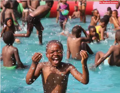  ?? Pic: Shepherd Tozvireva ?? Children enjoy themselves in a swimming pool at the Kadoma Agricultur­al Show on Friday