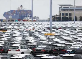  ?? LUKE SHARRETT / BLOOMBERG 2016 ?? American-made BMWs sit at port in Charleston, S.C., before being driven onto vehicle carrier ships. BMW is the U.S.’s top auto exporter, sending $10B in cars abroad last year.