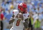  ?? GERRY BROOME / AP ?? Louisville QB and Heisman winner Lamar Jackson, who grew up in South Florida, said his family is safe after Hurricane Irma ravaged the state.