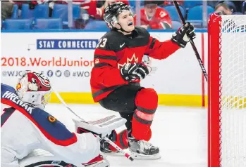  ?? MARK BLINC/THE CANADIAN PRESS ?? Team Canada forward Sam Steel celebrates his goal against Slovakian goalie David Hrenak during their 6-0 world juniors preliminar­y round win on Wednesday in Buffalo, N.Y.