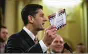  ?? AL DRAGO / THE NEW YORK TIMES ?? House Speaker Paul Ryan, R-Wis., with other Republican legislator­s, holds up an example of what a “postcard” tax return might look like during a news conference in Washington on Thursday.