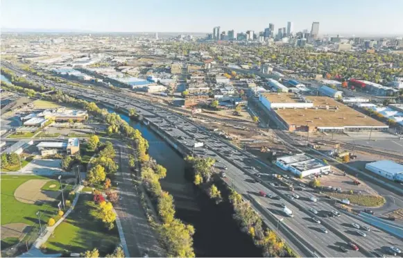  ?? RJ Sangosti, The Denver Post ?? Morning rush-hour traffic makes its way along Interstate 25 on Thursday in Denver. Despite a growing population, the state spends less on roads today TRAFFIC TROUBLES: than it did a decade ago.