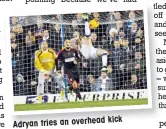  ??  ?? kick Adryan tries an overhead