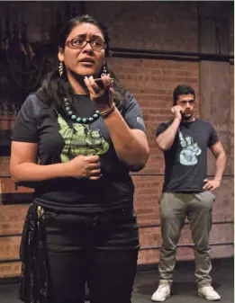  ?? SYDONIA LUCCHESI ?? Alejandra Gonzalez (foreground) and Zgjim Baraliu perform in “Ellis,” a theater work based on immigrant stories.