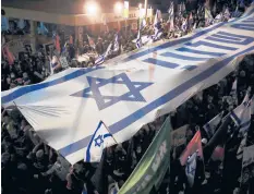  ?? SEBASTIAN SCHEINER/AP ?? Protesters rally against Israel’s Prime Minister Benjamin Netanyahu on Saturday in Jerusalem.