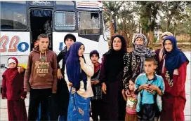  ?? SANA VIA AP ?? Syrian government troops have liberated these hostages among 19 freed since July in a military operation in the Hamima area east of Palmyra, ending a months-long crisis that stunned Syria’s Druze community.