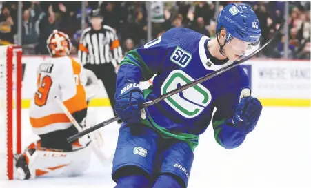  ?? BEN NELMS/THE CANADIAN PRESS FILES ?? Canucks centre Elias Pettersson is one of 17 internatio­nal players at Rogers Arena camp, who have been split into two groups. Local, non-quarantine­d players form a third group, and Canadians travelling from elsewhere a fourth. All are being kept apart, for now.