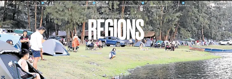  ?? —PHOTO COURTESY OF SAN MARCELINO PUBLIC INFORMATIO­N OFFICE ?? HOLIDAY GETAWAY Tourists pitch tents around Mapanuepe Lake in San Marcelino, Zambales, in this photo taken on Feb. 9. At least 1,508 campers and tourists visited the area that day, a Chinese New Year holiday, making it the highest record of arrivals there.