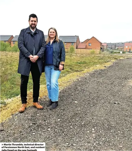  ?? ?? > Martin Thrumble, technical director of Persimmon North East, and resident Julia Dowd on the new footpath