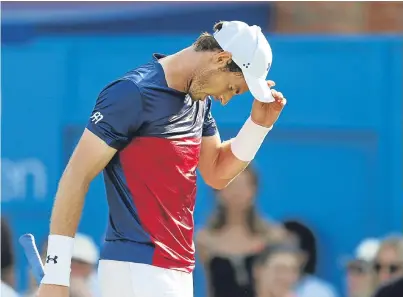  ?? Picture: PA. ?? A dejected Andy Murray on his way to defeat at Queen’s. However Greg Rusedski believes he still has a great chance of winning Wimbledon.