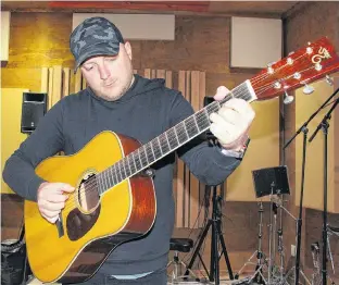  ?? ANDREW WATERMAN • THE TELEGRAM ?? Since his early 20s, Justin Fancy has been playing covers on George Street while studying other musicians and trying to find the confidence to write and record his original country music. In September 2020, at the age of 34, he released his first album, “Sure Beats a Good Time.” On Friday he will perform at The Bella Vista, his second show since the release of the album.