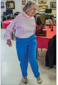  ?? WILLIAM HARVEY/RIVER VALLEY & OZARK EDITION ?? Kathleen Kennedy, 91, dances an Irish jig at the Mayflower Senior Citizens Center. She won dozens of dance competitio­ns when she was growing up in New York, and she performed in two movies, including Top o’ the Morning in 1949, which starred Bing Crosby and Barry Fitzgerald. She said Crosby framed her 85 or so dance medals and put them on a wall of a movie set.
