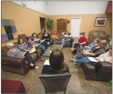  ?? File Photo/J.T. WAMPLER ?? Kate Siegenthal­er conducts a weekly group session at Havenwood in Bentonvill­e. Havenwood provides transition­al housing for single mothers.