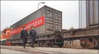  ?? ZHANG FAN / FOR CHINA DAILY ?? Staff members from Shenyang Customs check goods on a China-Europe train in Liaoning bound for Europe.